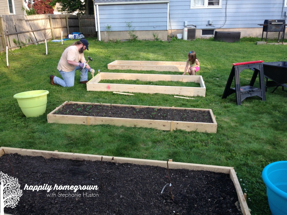If you've ever looked for raised garden beds, you know there are hundred of options. Here is an easy DIY raised garden bed that anyone can make!