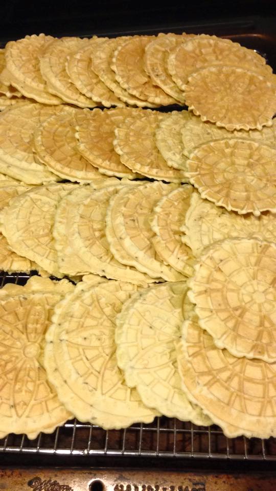Pizzelles are a thin, crisp, Italian wafer cookie flavored with anisette. They are a great Christmas cookie, but now we make them year round!